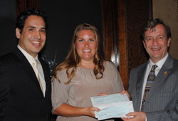 RNASA Foundation President Rodolfo Gonz&aacute;lez (left), Stacey Welch - Education Specialist from Texas A&M, (center) and RNASA Foundation Treasurer Geoff Atwater (right) presenting a check to Stacey Welch